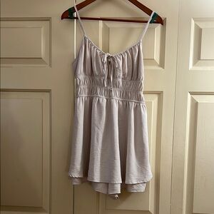 No Boundaries Light Beige Spaghetti-Strap Romper Gathered top, skirt over shorts